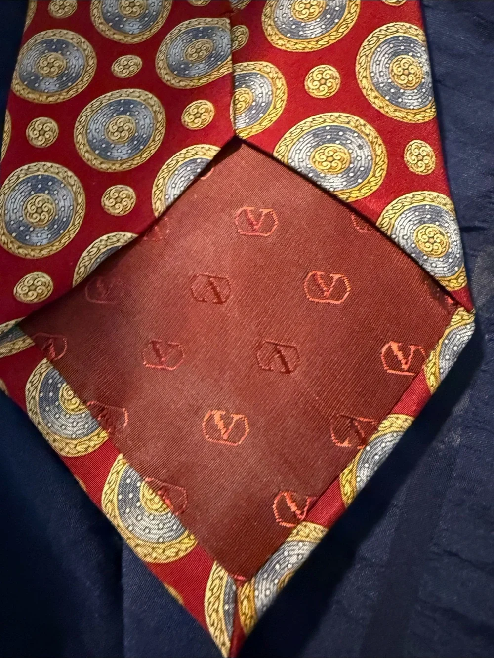 Valentino Red Silk Tie with Gold and Blue Medallions